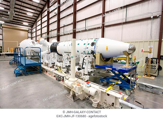 The fully-assembled launch abort system for the Pad Abort-1 (PA-1) flight test is in the final integration and test facility during preparations for the test at...