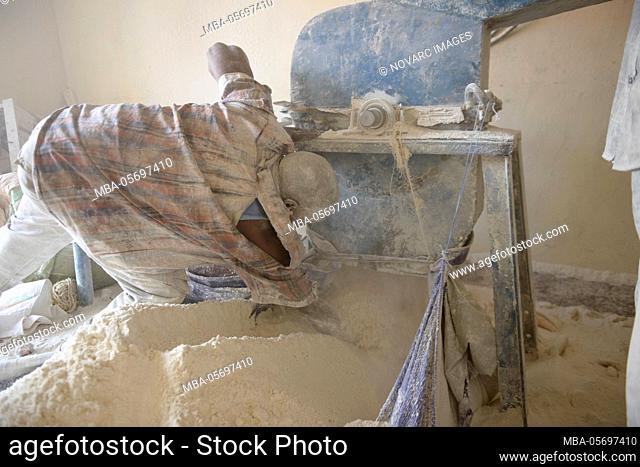 Workers making cassava, Burundi, Africa