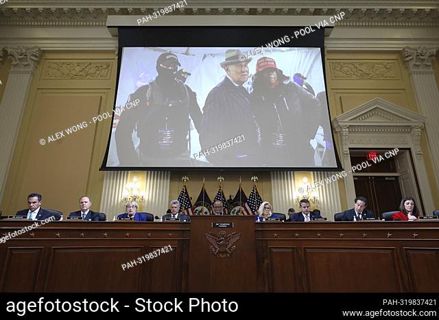WASHINGTON, DC - OCTOBER 13: A photo of Roger Stone, a long time conservative political operative and consultant, being protected by members of the Oath Keepers...