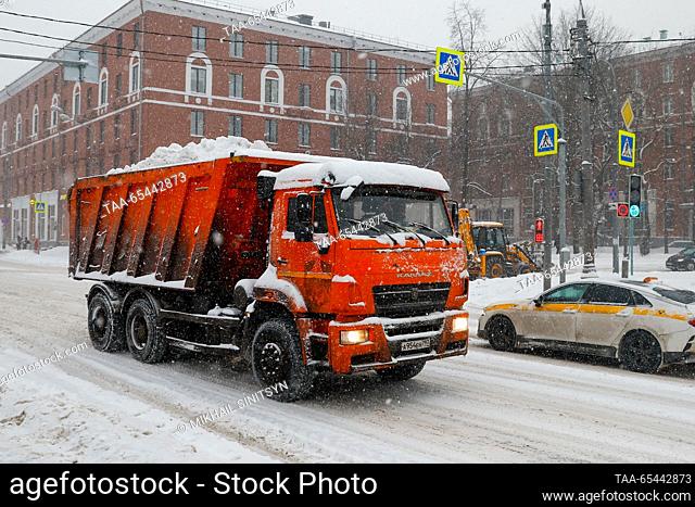 RUSSIA, MOSCOW - DECEMBER 3, 2023: Snow removal equipment is seen in a street during a snowfall. Mikhail Sinitsyn/TASS