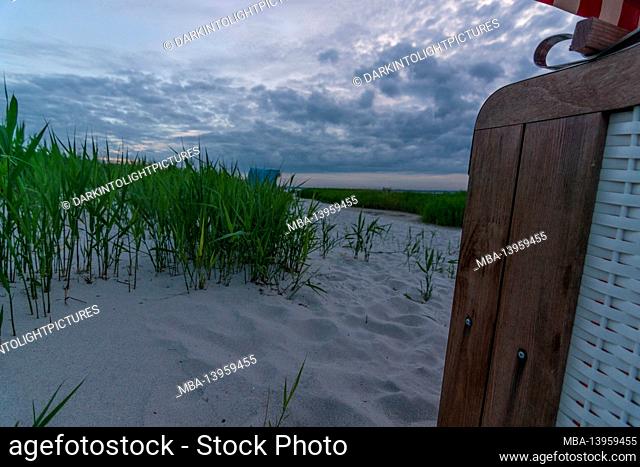 Evening sky, beach chair, stone, Baltic Sea, Germany