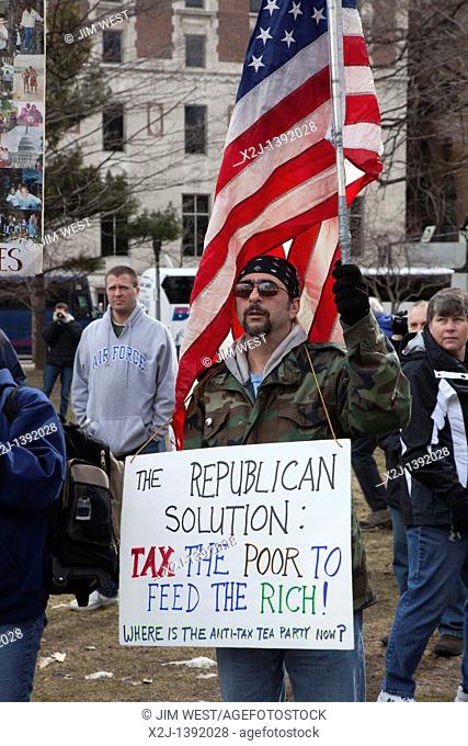 Lansing, Michigan - Senior citizens rally against a plan by Michigan Governor Rick Snyder to tax pensions and use the revenue generated for a corporate tax cut...