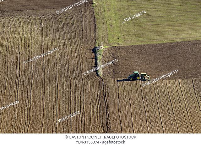 Farm tractor marking in the land, Mallorca, Balearic Island, Spain. Aerial view picture