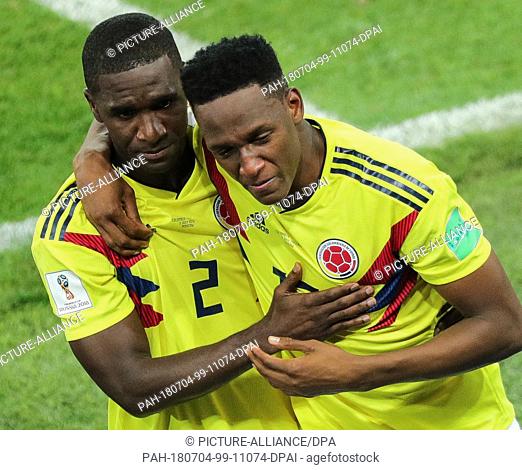 03 June 2018, Russia, Moscow: Soccer, FIFA World Cup, round of 16, Colombia vs England at the Spartak Stadium. Colombia's Yerry Mina (r) and Cristian Zapata