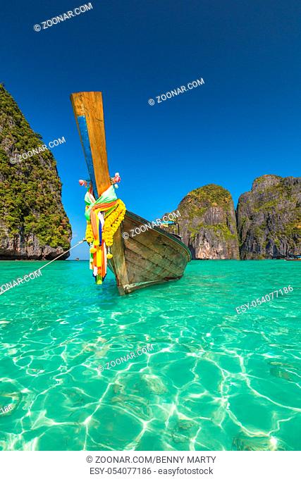 Long Tail Boat, traditional wooden boat, at Maya Bay lagoon of famous movie The Beach with Leonardo DiCaprio, Phi Phi Leh, Andaman Sea in Thailand