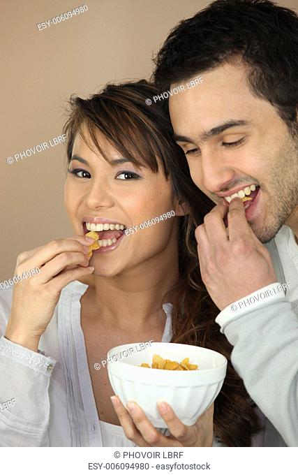 Couple eating cereal