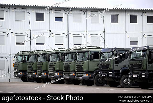 03 March 2022, Lithuania, Rukla: Military trucks of the German Armed Forces, part of the German-led multinational battalion of the NATO Enhanced Forward...