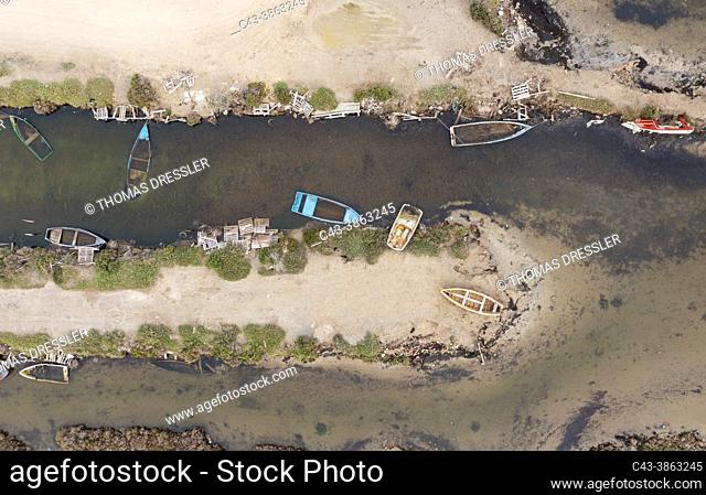 Boat cemetery. Aerial view. Drone shot. Ebro Delta Nature Reserve, Tarragona province, Catalonia, Spain