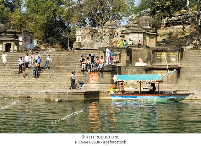 Ghats on the Narmada River at the Ahilya Fort and temple complex, Maheshwar, Madhya Pradesh state, India, Asia