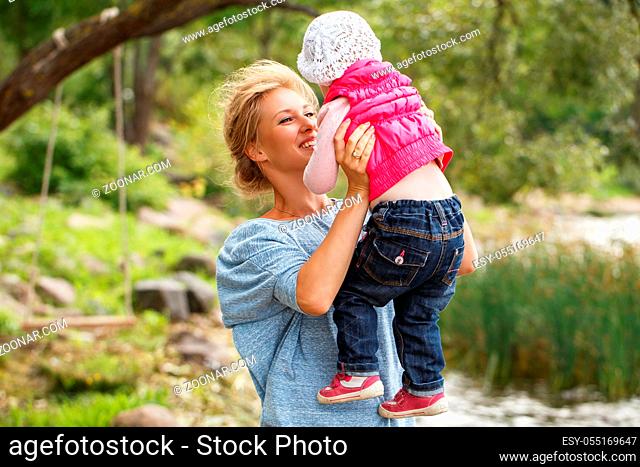 Young mother with adorable daughter