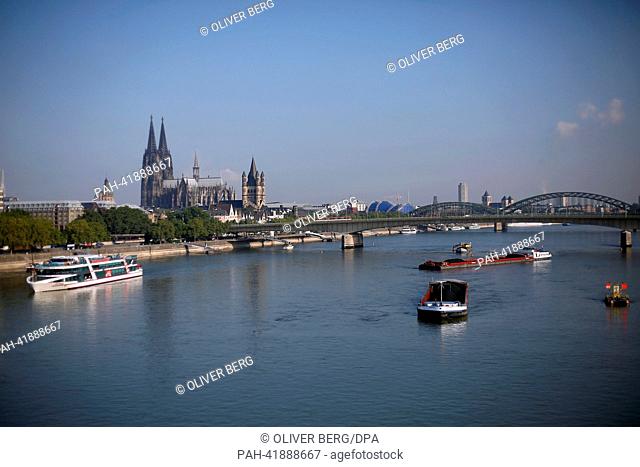 Two parts of a combination of a push boat and barges (R) have run aground in the Rhine in Cologne, Germany, 20 August 2013