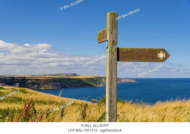 England, North Yorkshire, Whitby. Signpost for the Cleveland Way on the Yorkshire coast near Whitby