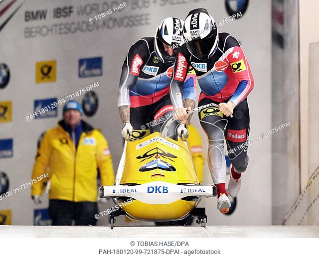 Germany's Nico Walther and Kevin Kuske launch into the race at the Bobsleigh World Cup men's doubles in Schoenau/Koenigssee, Germany, 20 January 2018