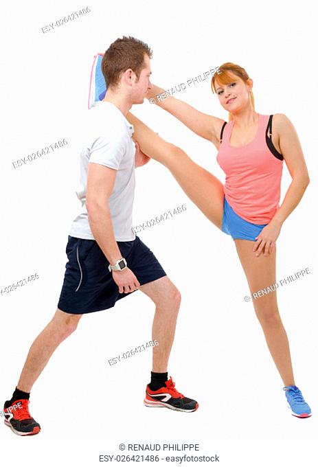 Beautiful young woman and man doing stretching exercises isolated on white background