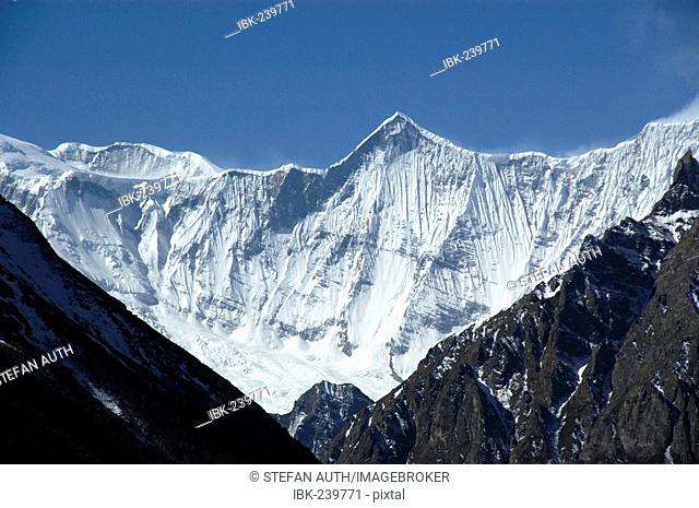 View onto ice-capped massive of Annapurna II and Lamjung Himal Nar-Phu Annapurna Region Nepal