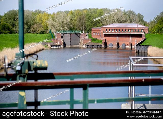 PRODUCTION - 04 May 2023, Lower Saxony, Emden: The Borssum pumping station stands on a canal near the River Ems in the southeast of the city