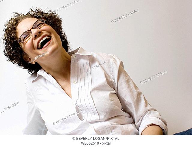 Sixty-four-year old woman smiling