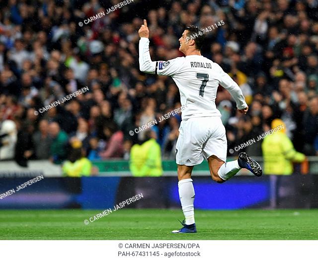 Cristiano Ronaldo of Madrid celebrates after scoring during the UEFA Champions League quarterfinal second leg soccer match between Real Madrid and VfL Wolfsburg...