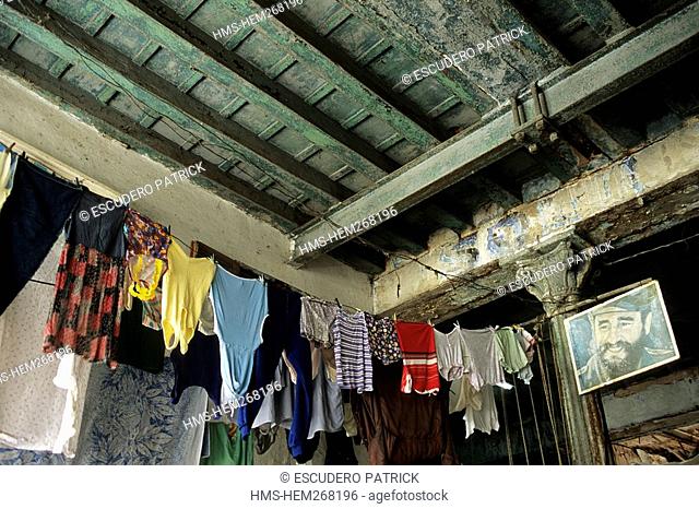 Cuba, Havana, La Habana Vieja District listed as World Heritage by UNESCO, Fidel Castro portrait and drying linen