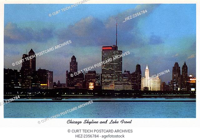 Chicago skyline and lake front, Illinois, USA, 1957. Postcard showing building son the shore of Lake Michigan with the Prudential Building in the centre of the...
