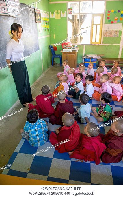 Elementary students in a classroom at the public school of the Aungmyazoo Monastary in Sagaing, a town outside of Mandalay, Myanmar
