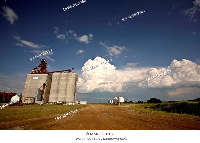 Storm clouds over Saskatchewan grain terminal