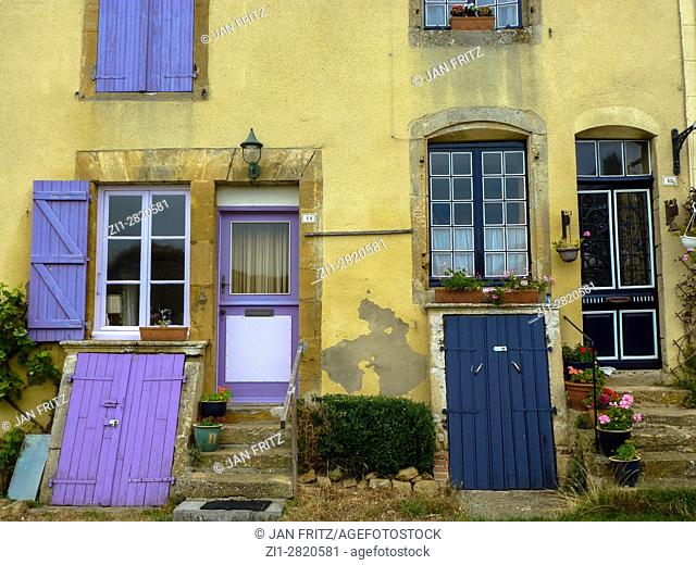 colorfull shutters and door at house in malmedy, france