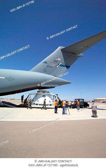 The Orion Pad Abort (PA-1) test article is unloaded from a Mississippi Air National Guard C-17, which carried it from Dryden Flight Research Center to Holloman...
