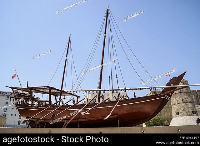 Traditional dhow boat on display. Al Fahidi Fort. Dubai. United Arab Emirates. Middle East