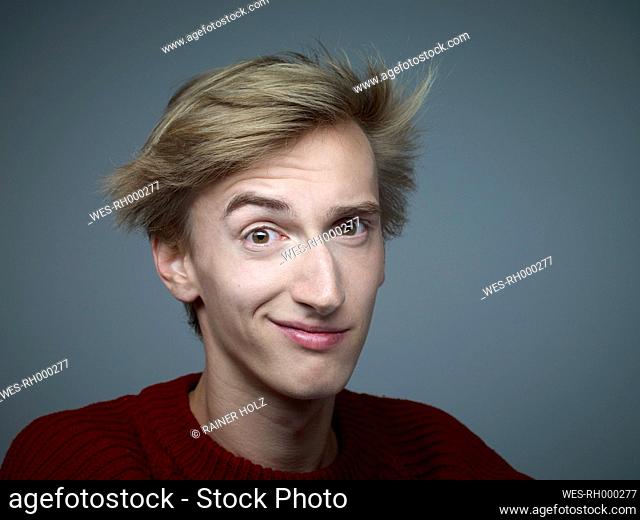 Portrait of helpless young man