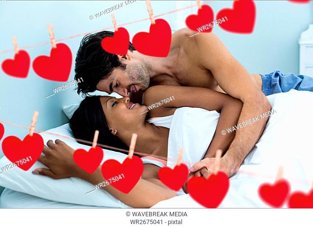 Young couple doing romance in bedroom at home
