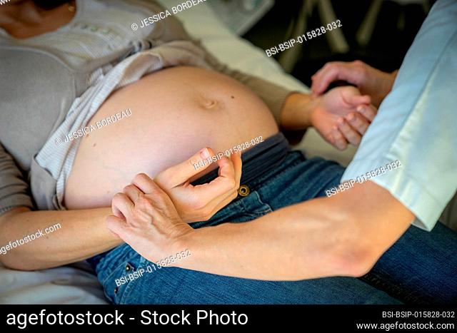 Consultation of a woman because of digestive disorders during her pregnancy