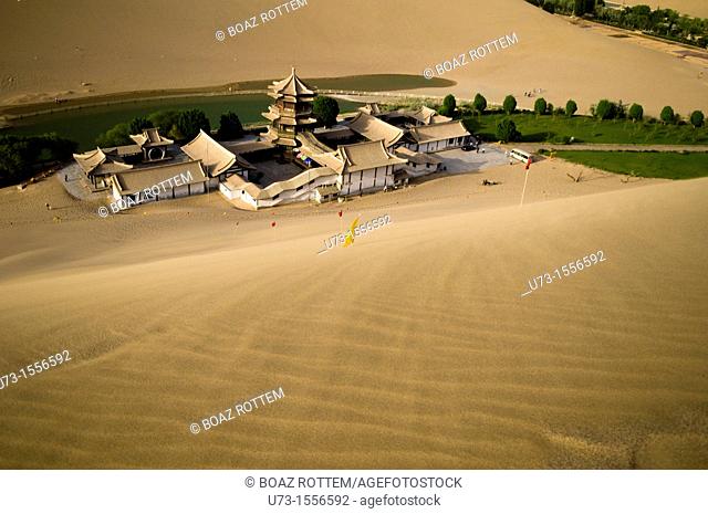 The picturesque temple by the Mingsha sand dunes in Dunhuang, Gansu, China