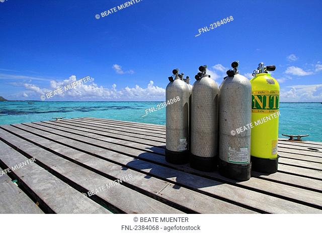 Diving cylinders on jetty, Tuamotu Archipelago, French Polynesia, Polynesia, Pacific Island
