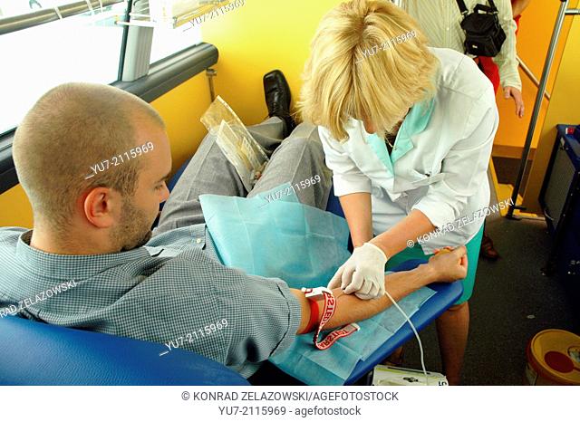 Volunteer blood donation in special vehicle in Warsaw Poland