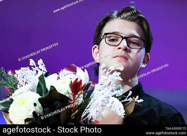 RUSSIA, MOSCOW - DECEMBER 12, 2023: The first place winner in the string category, cellist Mikhail Vasilyev, attends an award ceremony for the 24th Nutcracker...