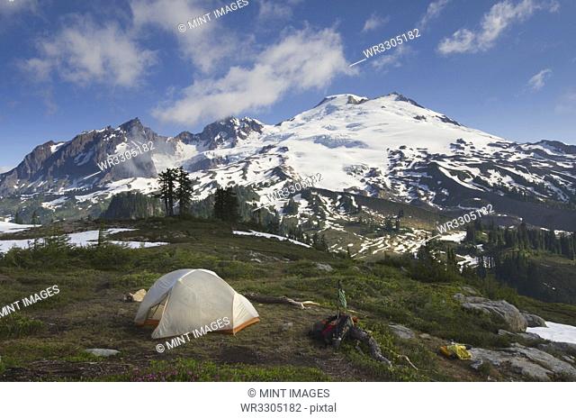 Tent at campsite in rocky mountain range, North Cascades, Washington, United States