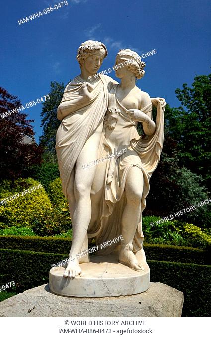 View of a Roman style statue in the gardens of Waddesdon Manor, a country house in the village of Waddesdon. Built in the Neo-Renaissance style of a French...