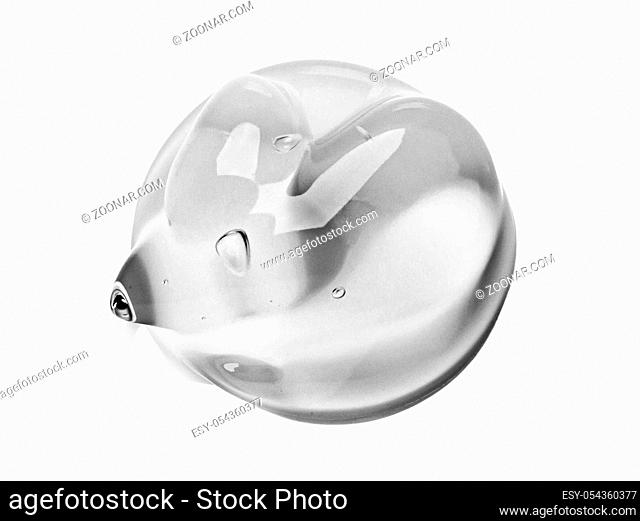 Squeezed cosmetic clear cream gel texture Iisolated on white background. Close up photo of transparent drop of skin care product
