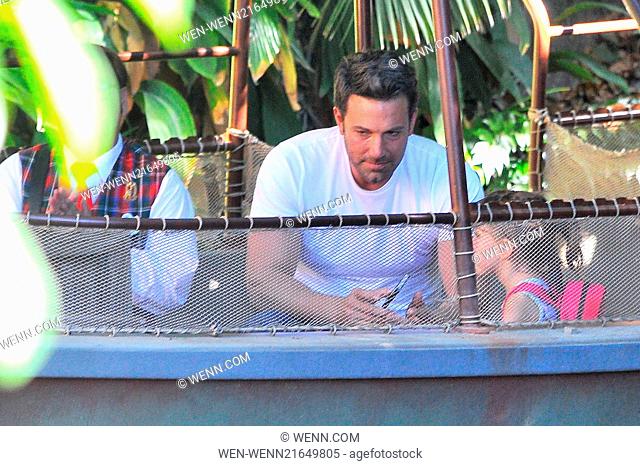 Ben Affleck takes his daughter Seraphina on a Disneyland Adventure. The pair were seen having fun throughout Fantasyland before going on a Jungle Cruise