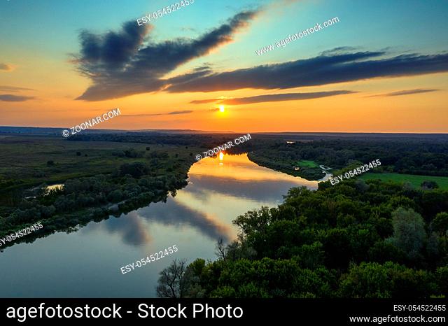 Aerial view landscape of sunrise or sunset with forest and river