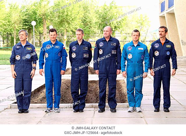 At the Cosmonaut Hotel crew quarters in Baikonur, Kazakhstan, the prime and backup crews for Expedition 20 pose for pictures as part of their traditional...