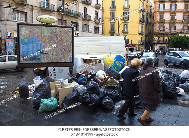 Uncollected trash due to strike at Piazza Carita square central Naples Campania Italy Europe
