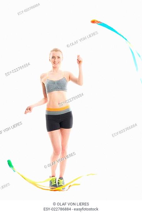 Blonde Sportlerin mit Schwingband
