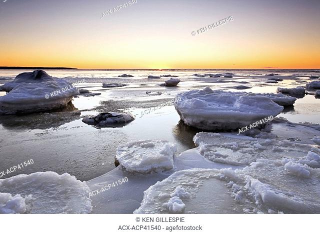 Ice on Lake Winnipeg at sunset. Victoria Beach, Manitoba, Canada