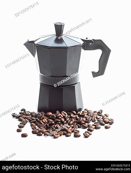 Coffee beans and bialetti coffee maker. Moka pot isolated on white background