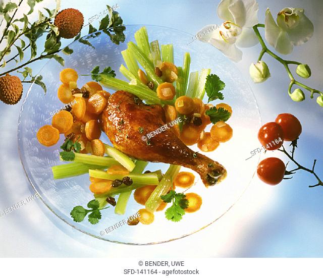 Chicken leg with carrots and celery and raisins