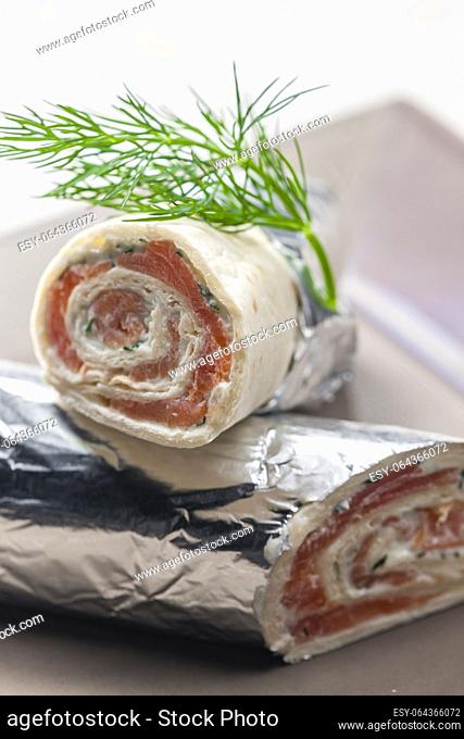 tortilla filled with smoked salmon and dill cream cheese
