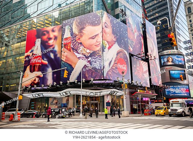 A winter themed Coca-Cola billboard dominates a Times Square intersection in New York. Fourth-quarter profits for Coca-Cola rose despite a drop in Diet Coke...