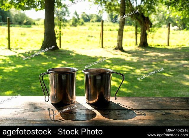 peenetal river landscape nature park, güstrow water hiking rest area, morning coffee in two camping cups